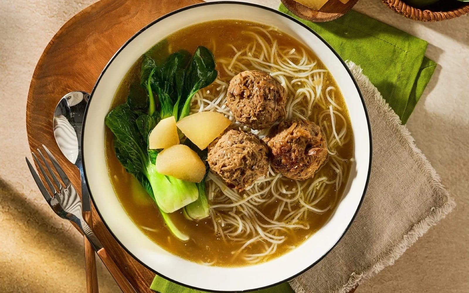 Bakso noodle soup with plant-based meatballs and bok choy